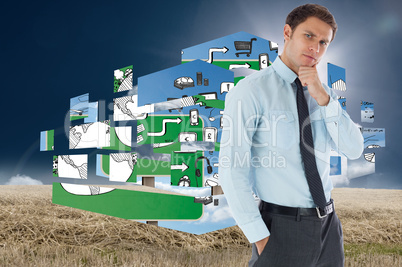 Composite image of thoughtful businessman with hand on chin