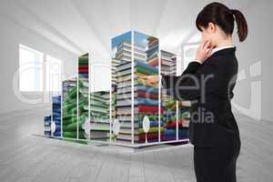 Composite image of thoughtful businesswoman pointing