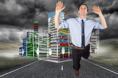 Composite image of businessman posing with arms raised