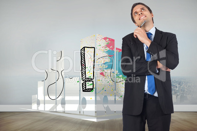 Composite image of thinking businessman holding pen