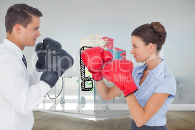 Composite image of colleagues in competition having a boxing mat