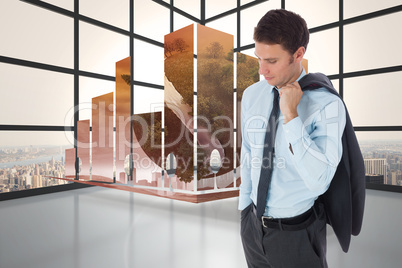 Composite image of serious businessman holding his jacket