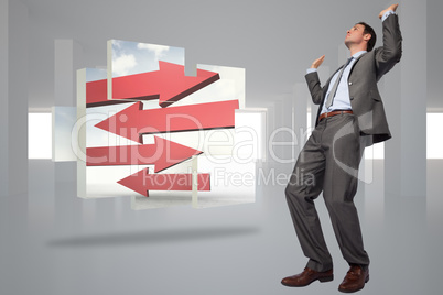 Composite image of businessman posing with hands up