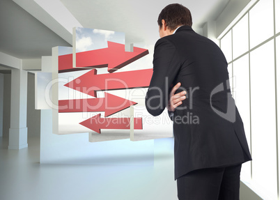 Composite image of thinking businessman