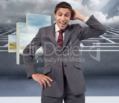 Composite image of thinking businessman scratching head