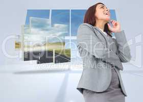 Composite image of smiling thoughtful businesswoman