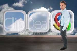 Composite image of serious businessman standing with hands in po