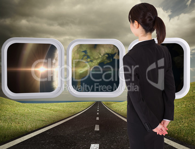 Composite image of businesswoman standing