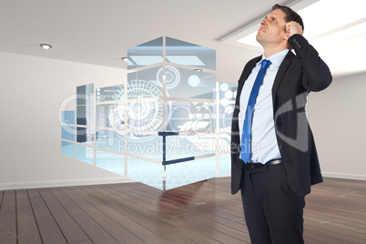 Composite image of thinking businessman scratching head