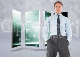 Composite image of serious businessman standing with hands in po