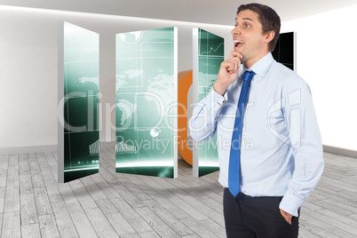 Composite image of thinking businessman touching his chin