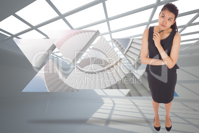 Composite image of thoughtful businesswoman