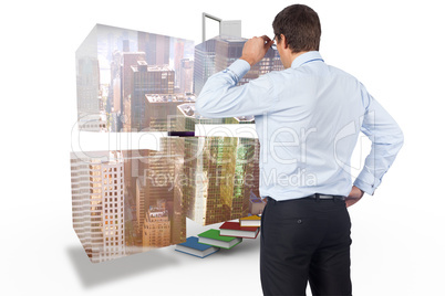 Composite image of thinking businessman tilting glasses