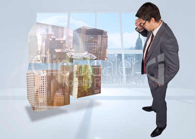 Composite image of thinking businessman touching his glasses