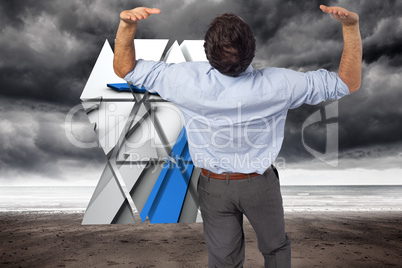 Composite image of businessman standing with hands up