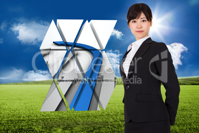 Composite image of serious businesswoman