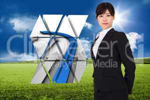 Composite image of serious businesswoman