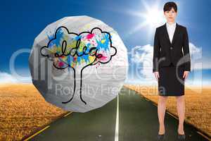 Composite image of serious businesswoman