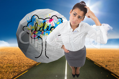 Composite image of worried businesswoman