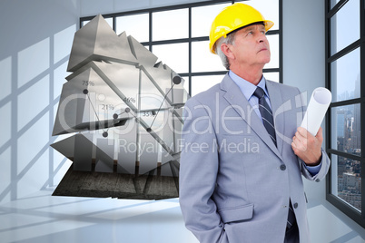 Composite image of mature architect taking a close look