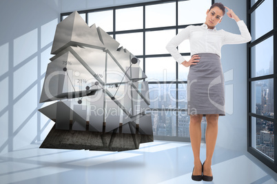 Composite image of focused businesswoman