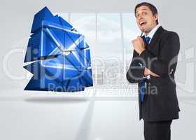 Composite image of thinking businessman holding pen