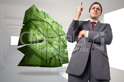 Composite image of thoughtful businessman holding pen