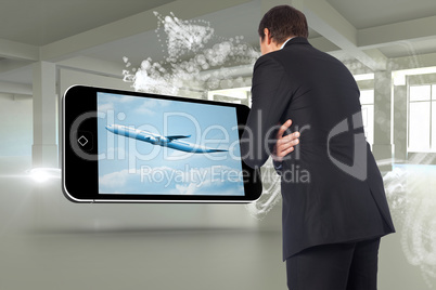 Composite image of thinking businessman