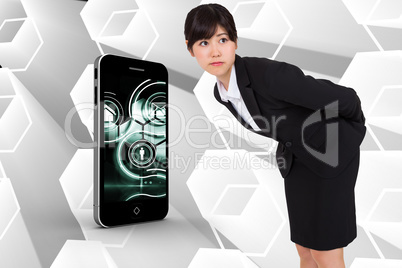 Composite image of serious businesswoman bending