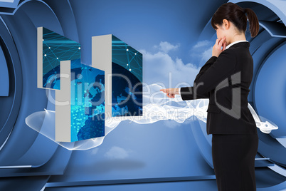 Composite image of businesswoman pointing