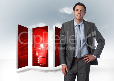 Composite image of smiling businessman with hand on hip