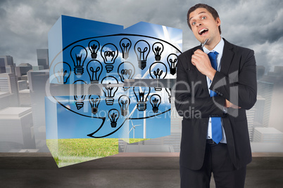 Composite image of thinking businessman holding pen