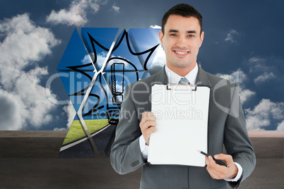 Composite image of businessman pointing with pen on clipboard