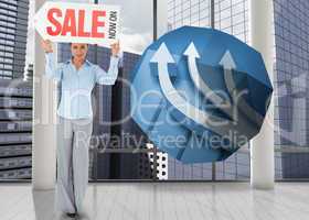 Composite image of businesswoman holding sign above her head