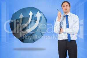 Composite image of thinking businessman holding pen