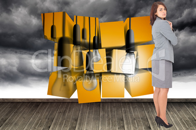 Composite image of focused businesswoman