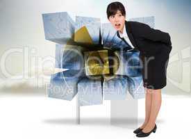 Composite image of surprised businesswoman bending