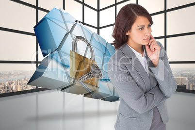 Composite image of focused businesswoman