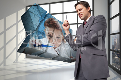 Composite image of thoughtful businessman holding pen