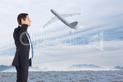 Composite image of thinking businessman scratching head