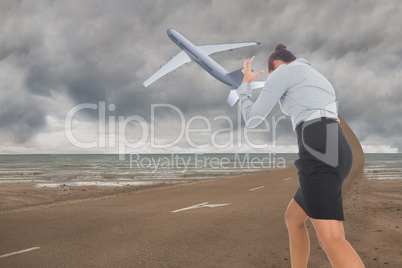 Composite image of businesswoman gesturing