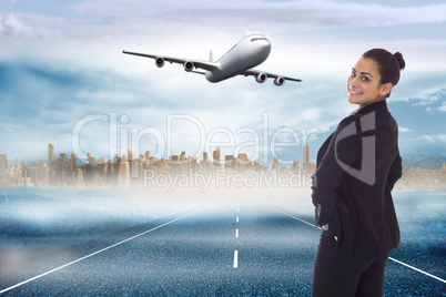 Composite image of happy businesswoman