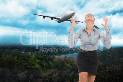 Composite image of furious businesswoman gesturing