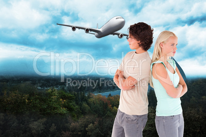 Composite image of unhappy couple posing