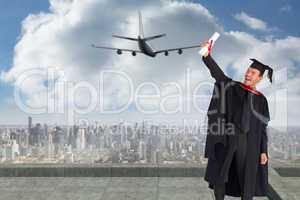 Composite image of delighted boy celebrating his graduation