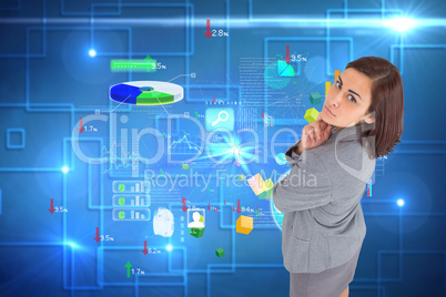 Composite image of focused businesswoman