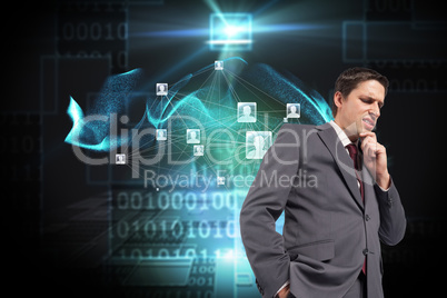 Composite image of thoughtful businessman with hand on chin