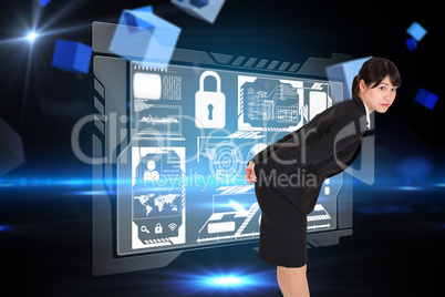 Composite image of serious businesswoman bending