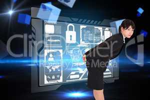 Composite image of serious businesswoman bending