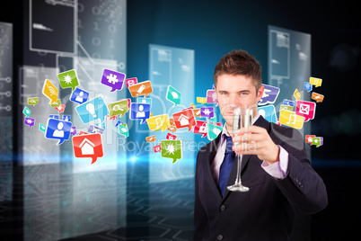 Composite image of businessman holding a champagne glass